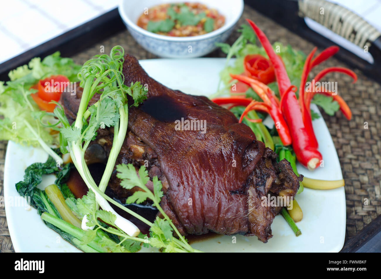 Steam pork leg with gravy and vegetable Stock Photo