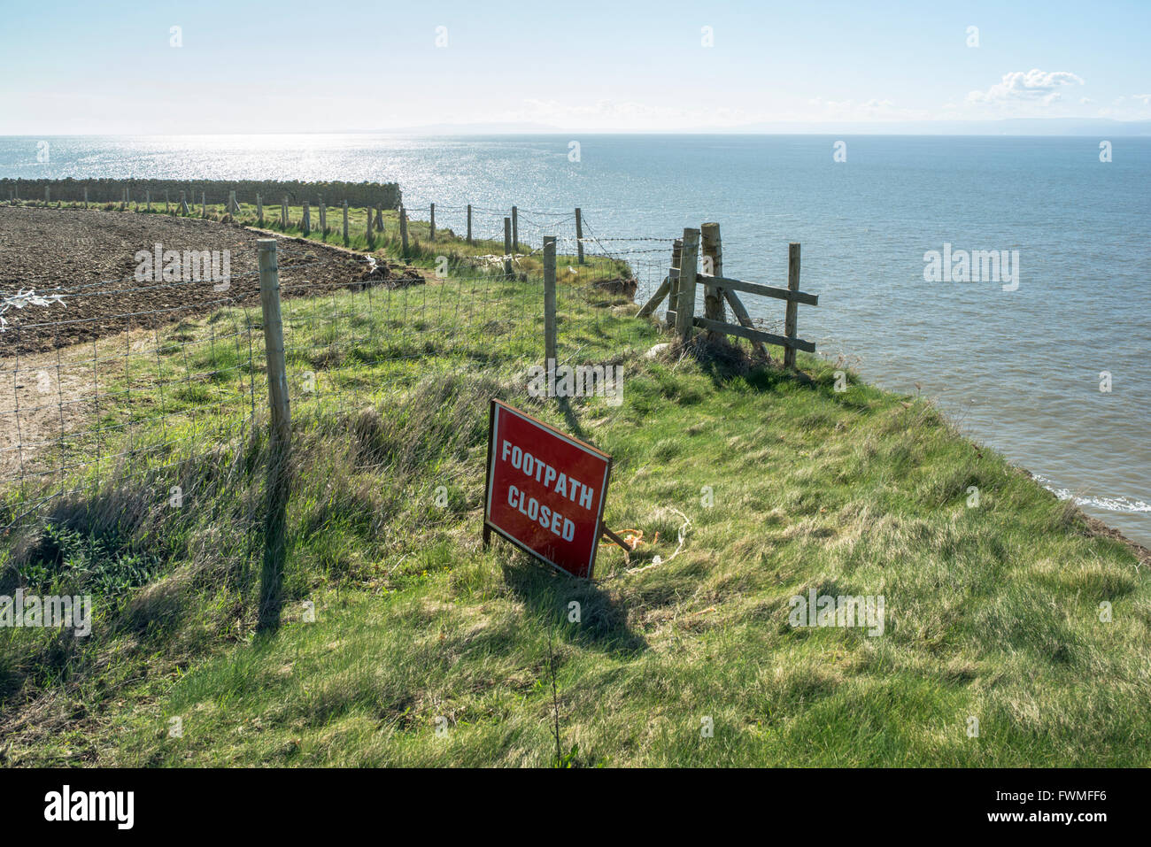 Footpath closed. Coastal erosion has caused the footpath to be moved twice Stock Photo