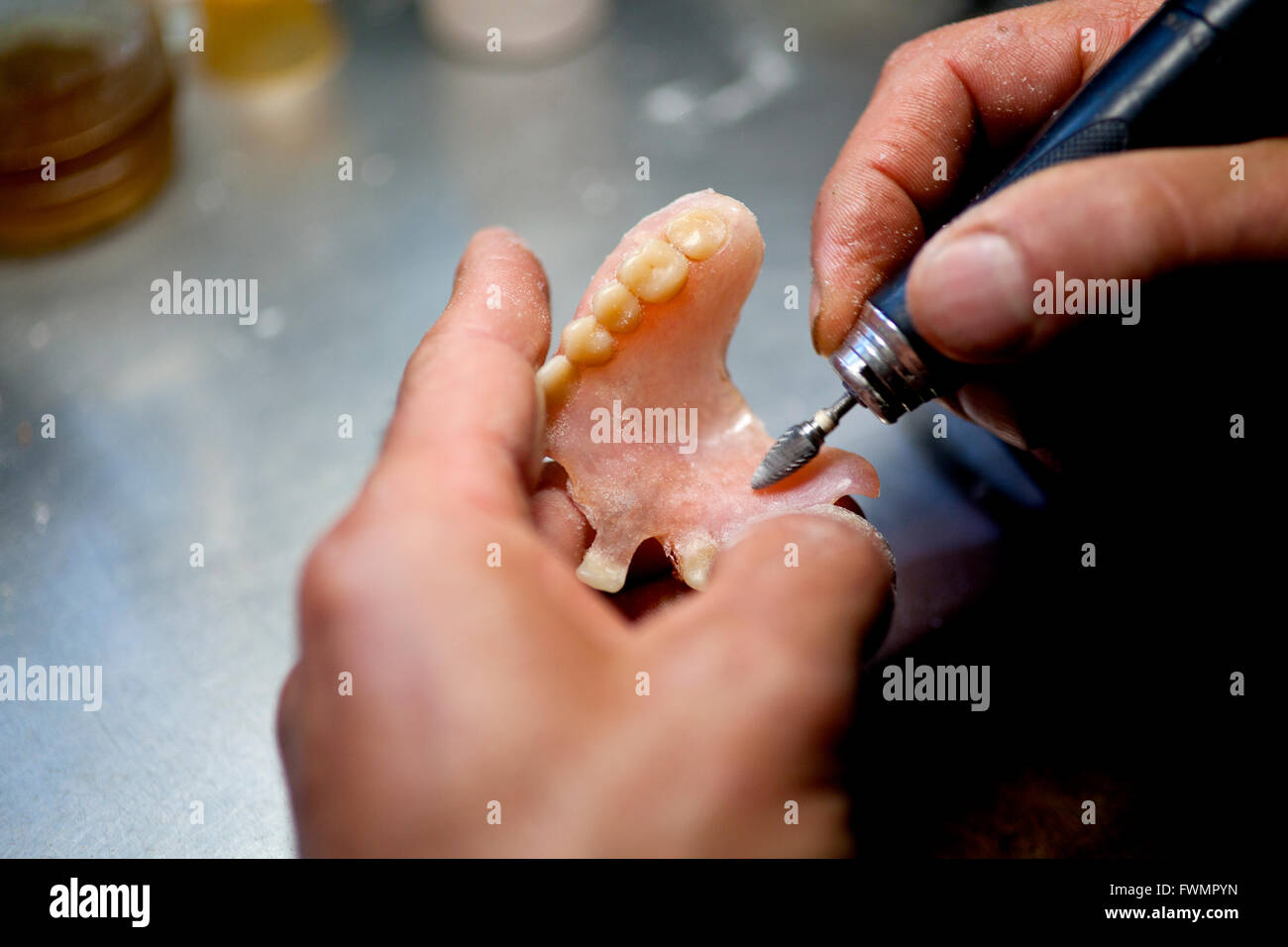 Repairing Artificial Human Teeth Stock Photo