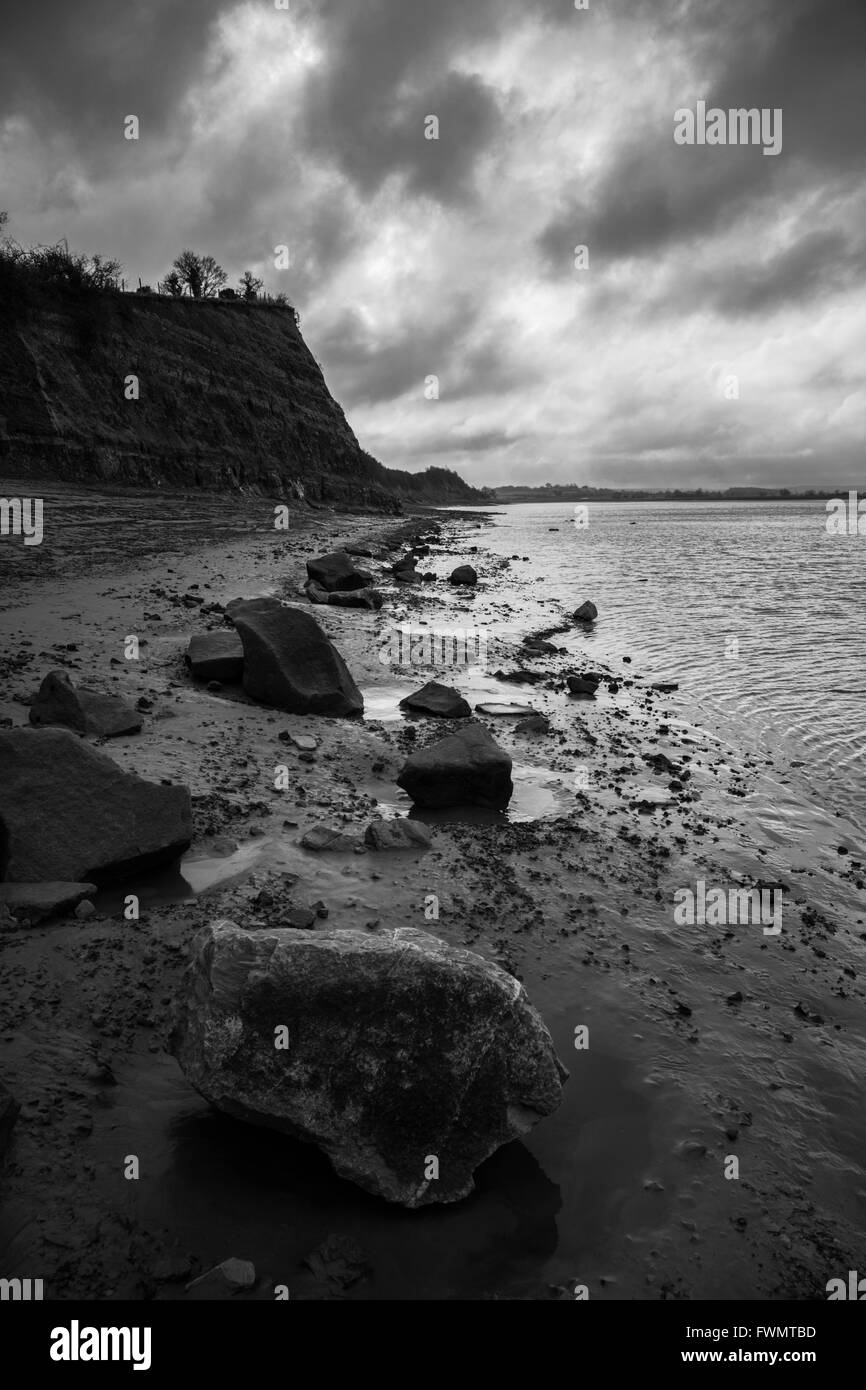 Dramatic rocky shoreline. Stock Photo