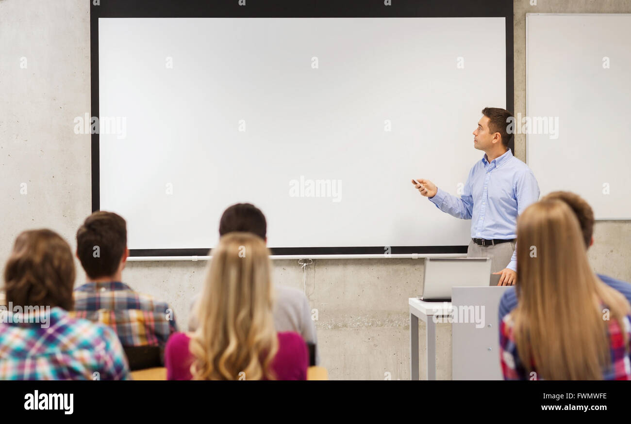 group of students and teacher in classroom Stock Photo - Alamy