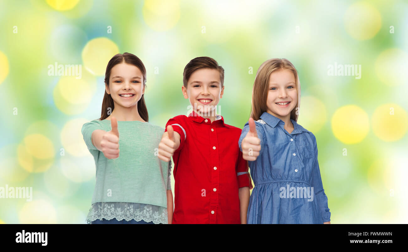 happy children showing thumbs up Stock Photo - Alamy