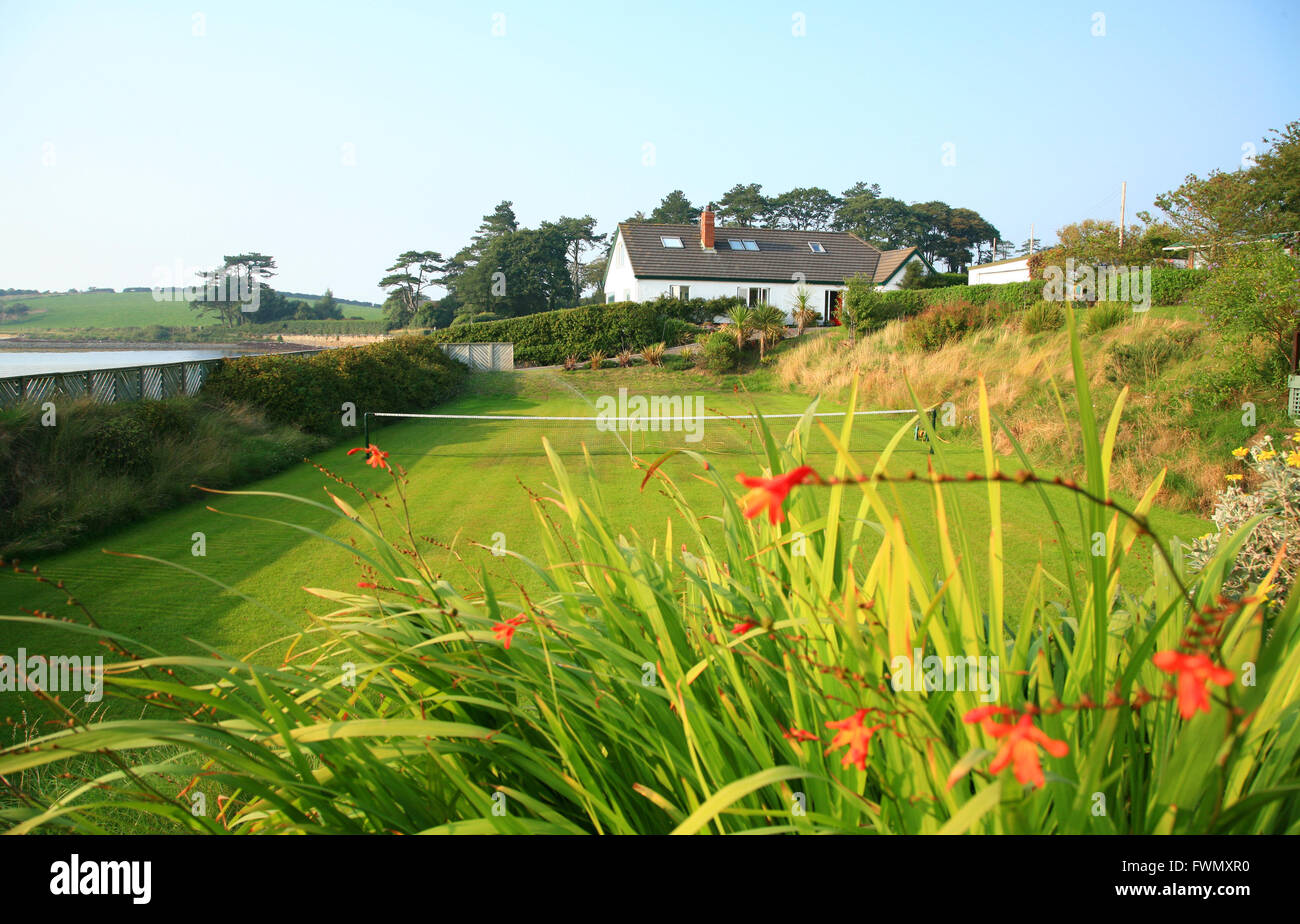 House with tennis court, near Portaferry, County Down, Northern Ireland Stock Photo