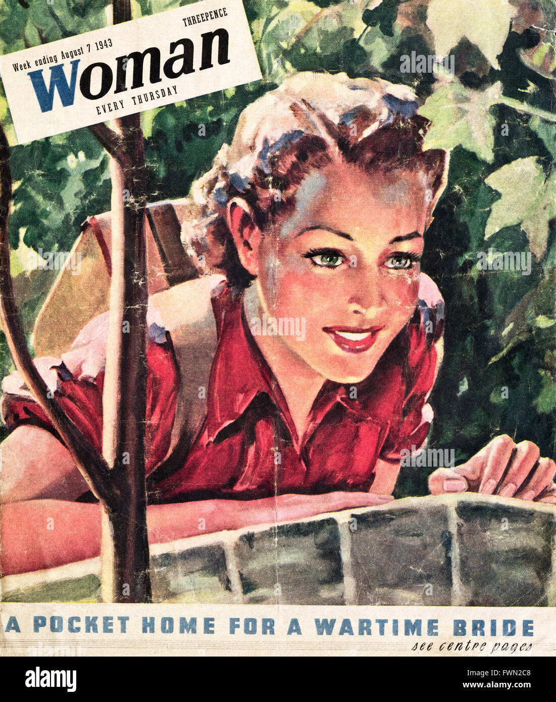Original vintage magazine cover from 1940s. Wartime magazine cover dated week ending 7th August 1943 WOMAN Stock Photo