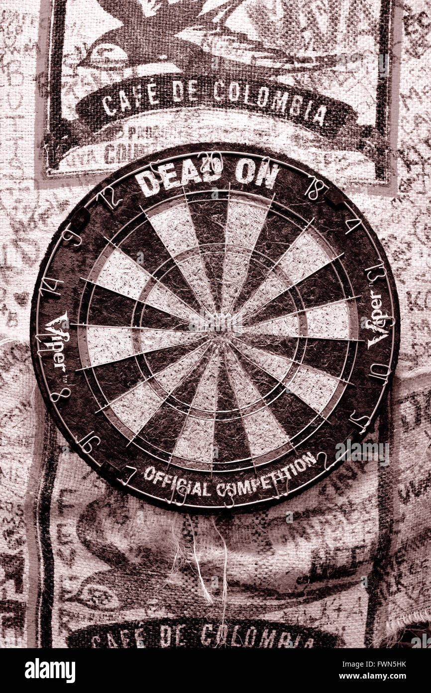 Fullstream Brewery & Tavern, Durham, North Carolina NC USA. Southern craft beer and food.  An old very used dart board in Sepia Stock Photo