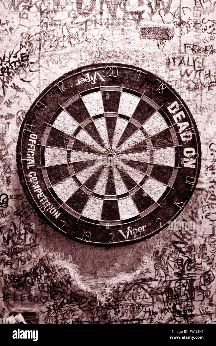 Fullstream Brewery & Tavern, Durham, North Carolina NC USA. Southern craft beer and food.  An old very used dart board in Sepia Stock Photo