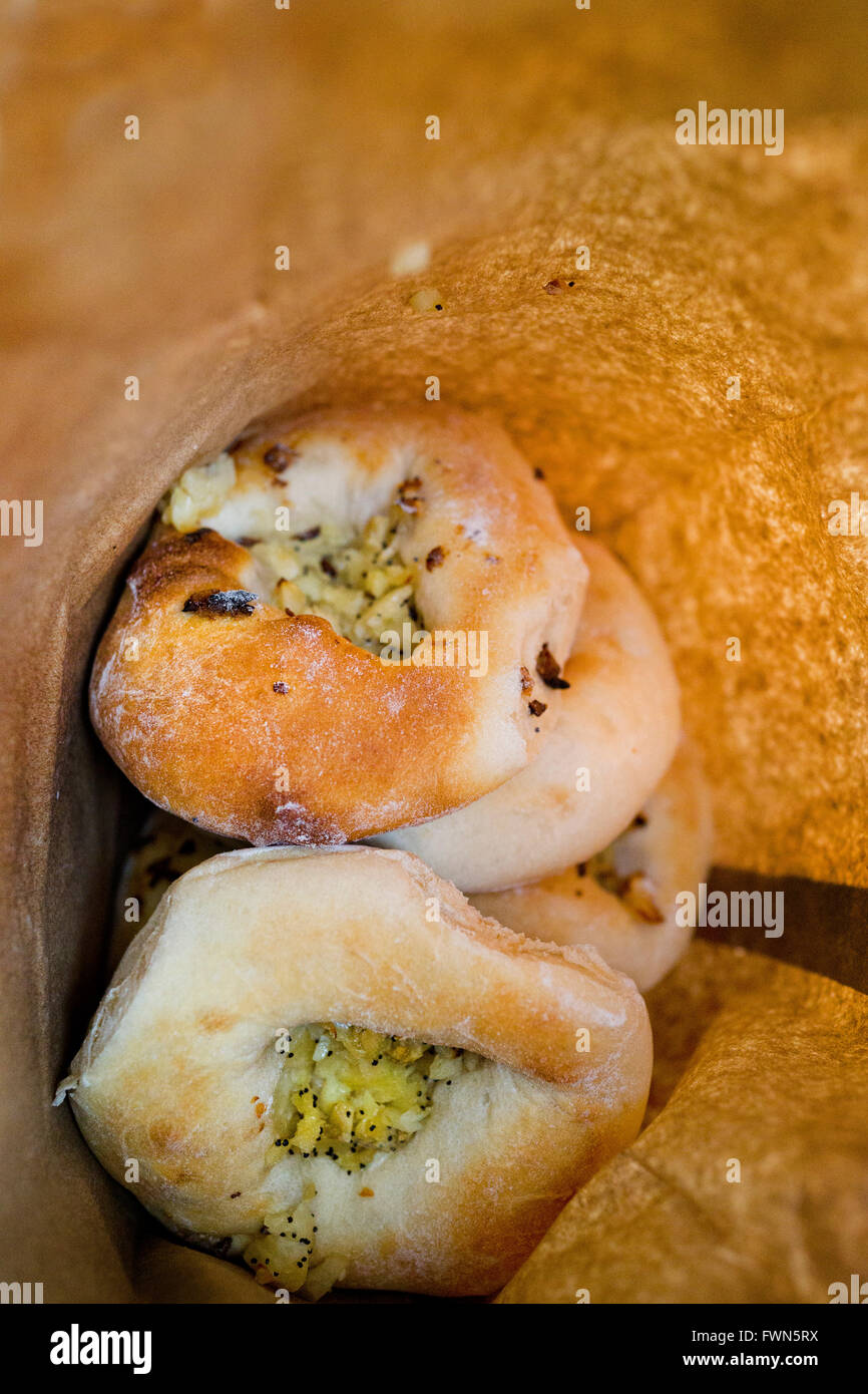 At Kossar’s, they have been baking their legendary bialys since 1936, and now the oldest remaining Bialy bakery in the USA Stock Photo