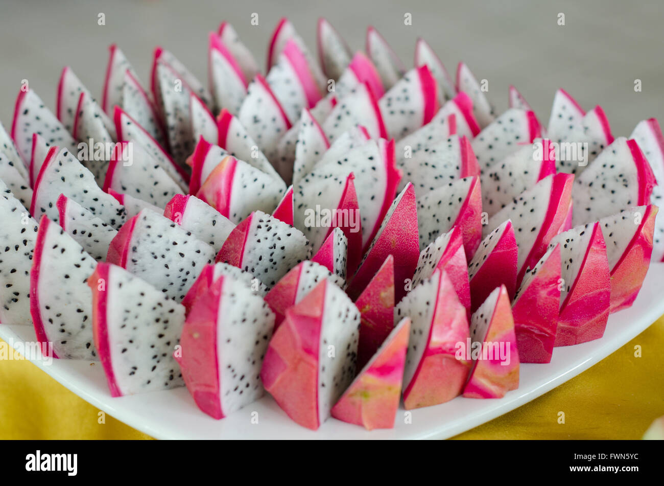 Slice of dragon fruit on a plate Stock Photo