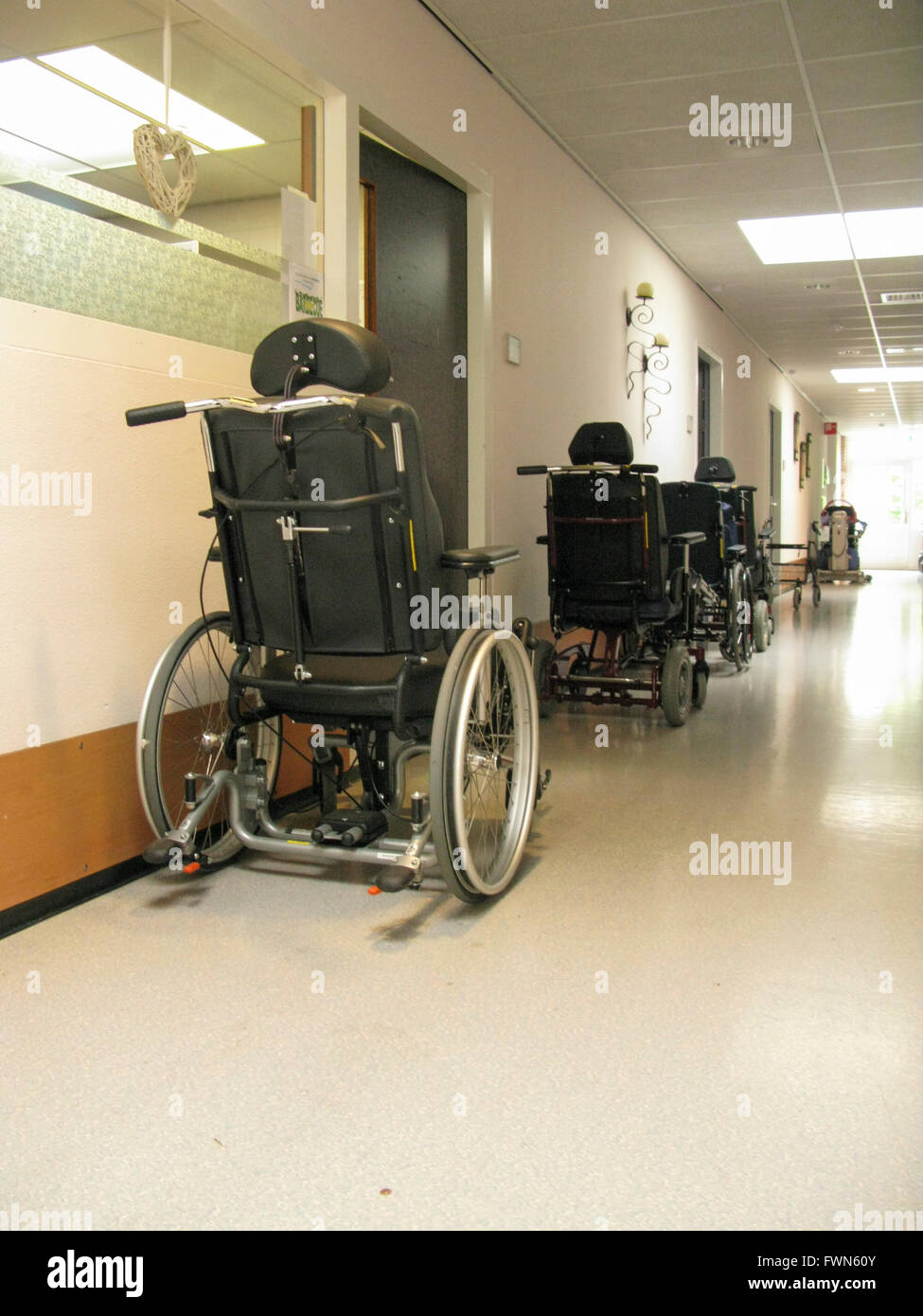 Wheelchairs in the hallway of a nursing home Stock Photo
