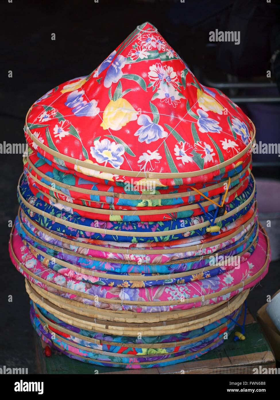 Traditional Chinese straw hats covered with colorful cloth Stock Photo