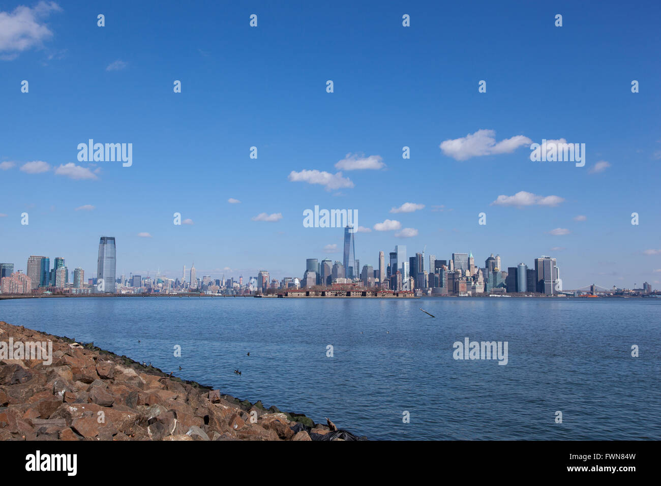 This image contains views of Jersey City and Manhattan, as seen from