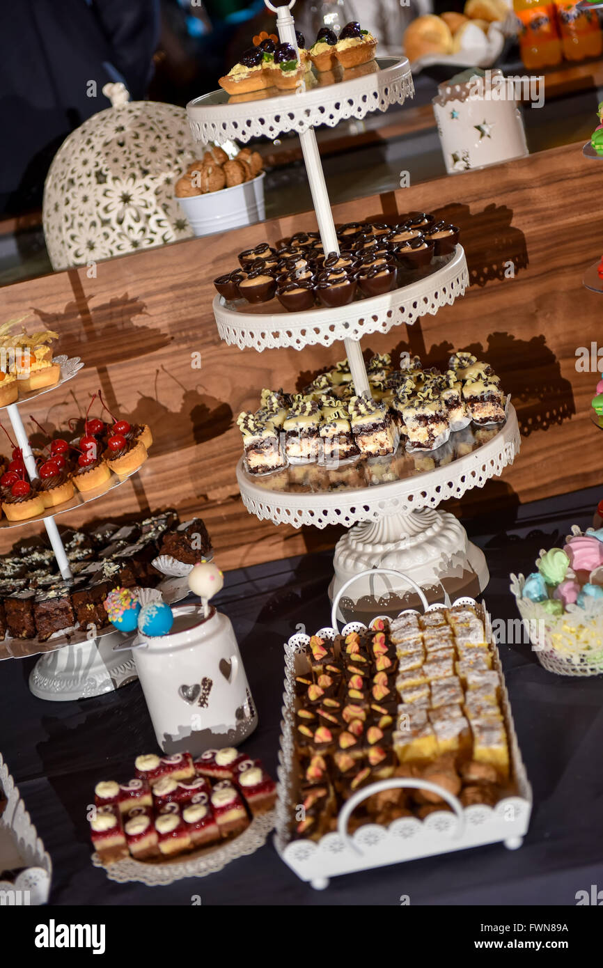 Candy bar on a stand during the wedding reception Stock Photo