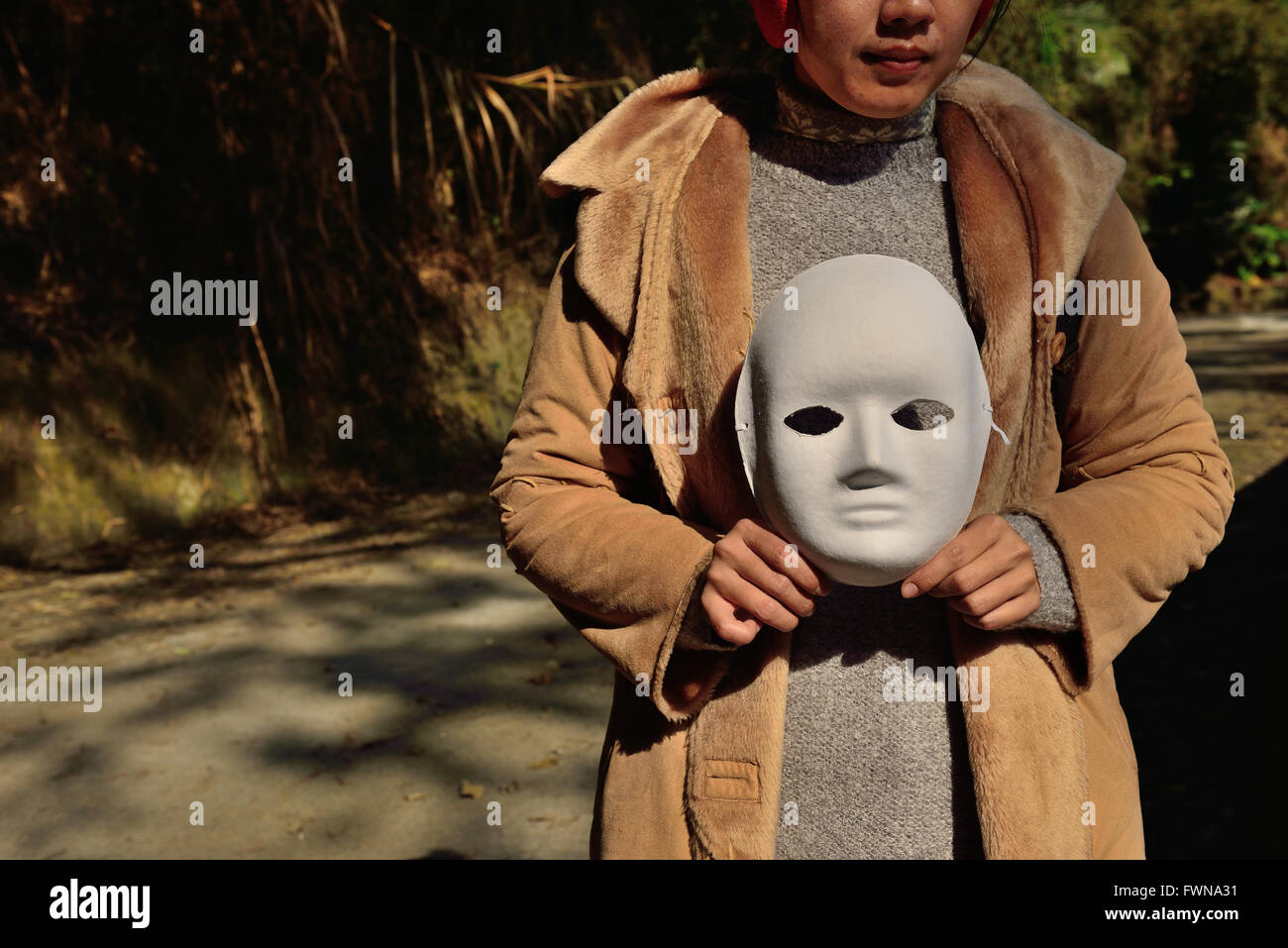 take off the mask Stock Photo