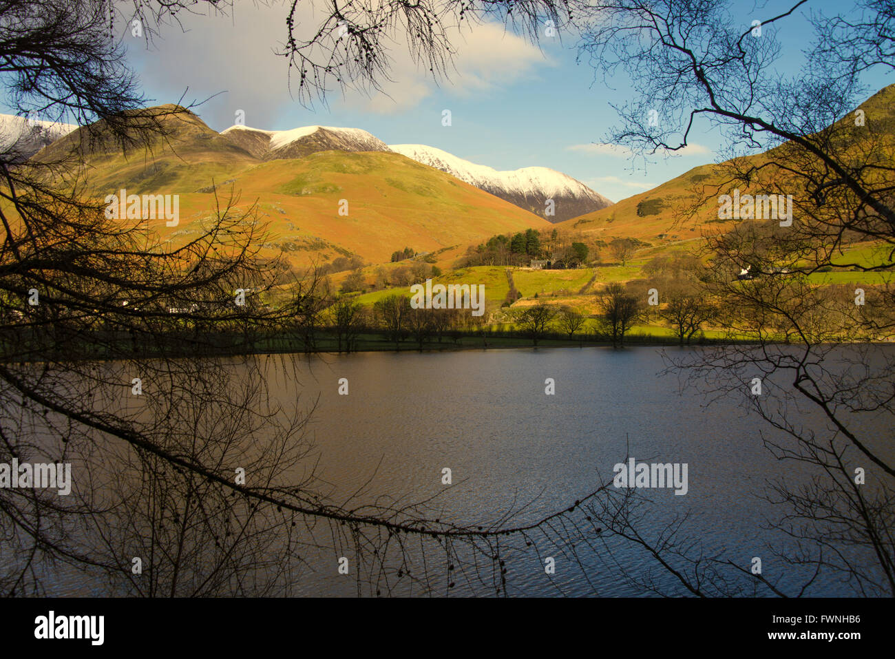 View across Buttermere towards Newlands Hause and Whiteless Pike and Edge. Stock Photo