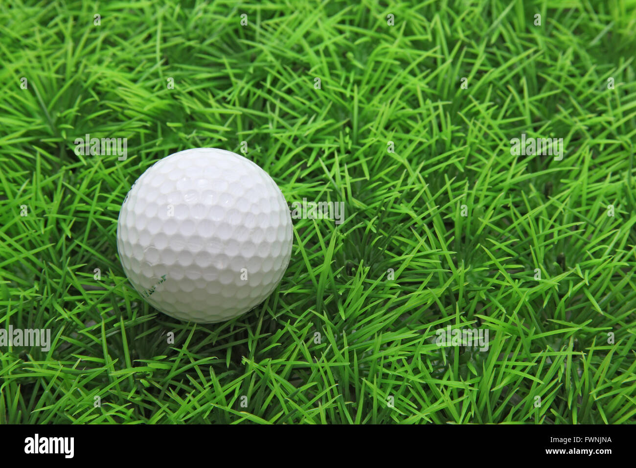 closeup of golf ball on green grass Stock Photo Alamy