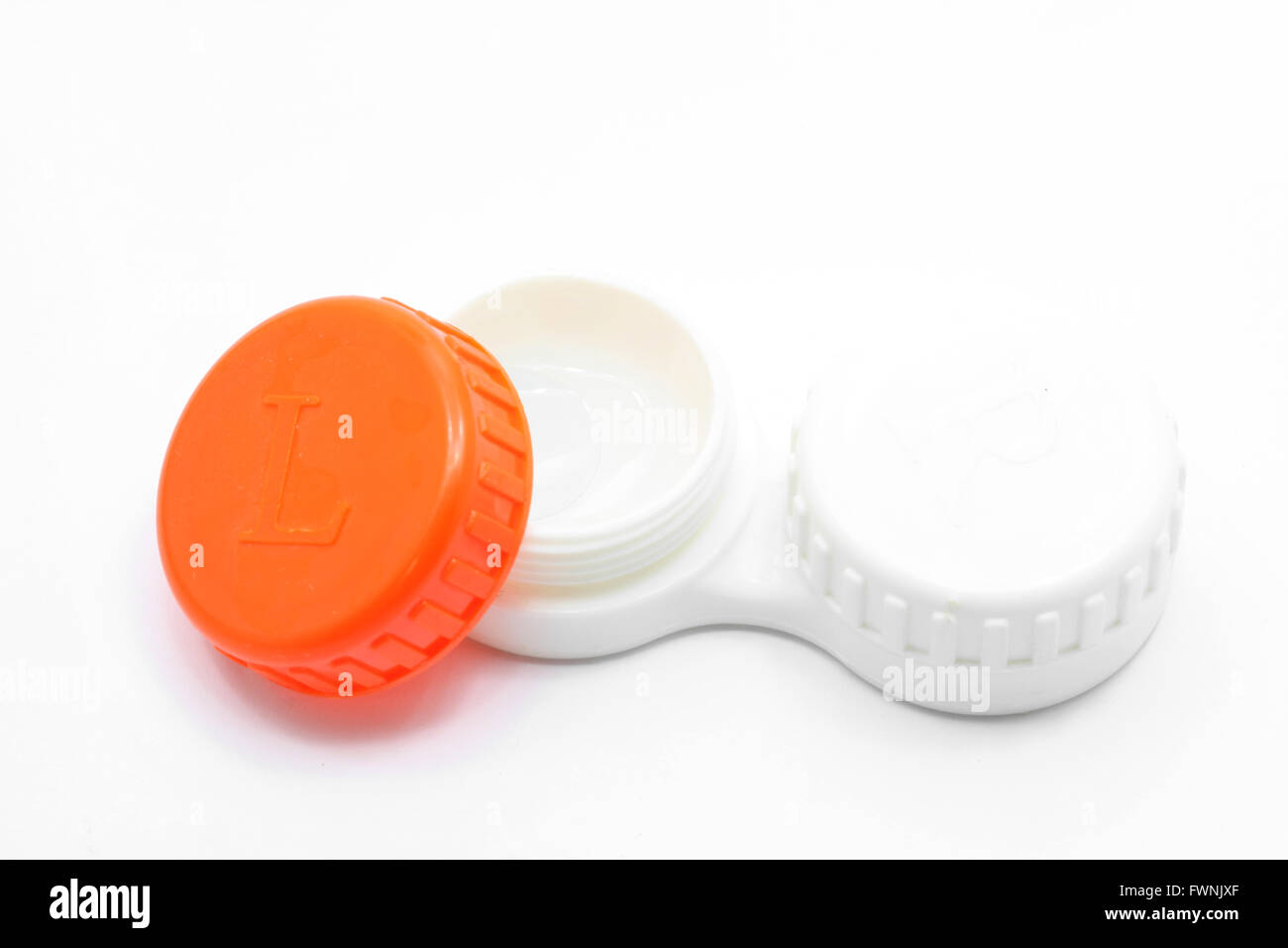 The contact lens is stored in plastic case Stock Photo Alamy