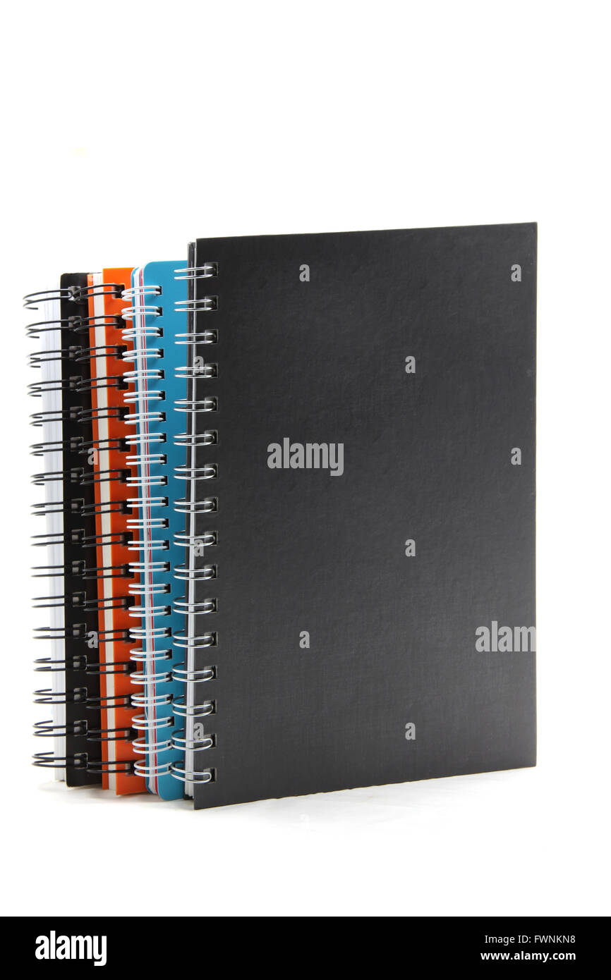 stack of ring binder note book isolated on white with blank black cover