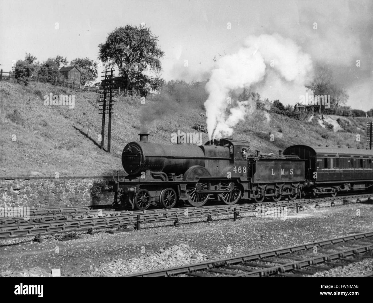 A former Midland Railway 2P inside cylinder 4-4-0 on a local passenger working. Stock Photo