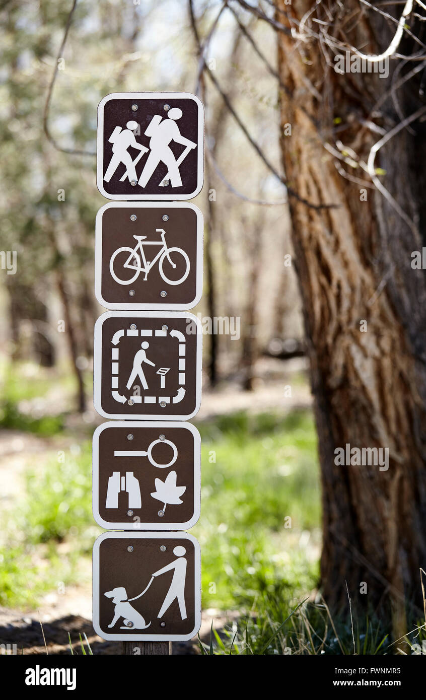 recreation use sign on walking hiking trail in forest Stock Photo