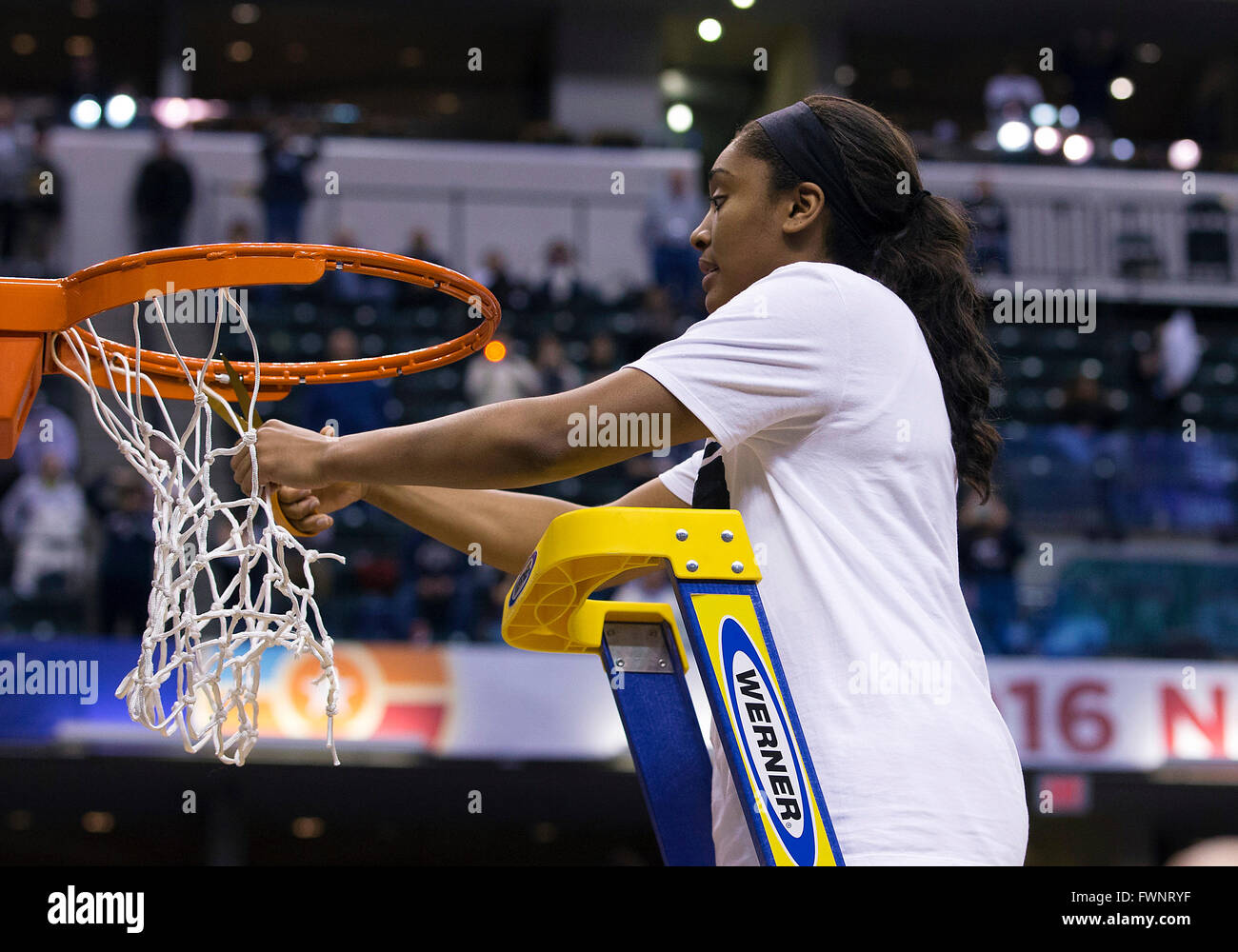 Indianapolis, Indiana, USA. 05th Apr, 2016. Connecticut forward Morgan Tuck (3) cuts a piece of the net after NCAA Basketball game action between the Syracuse Orange and the Connecticut Huskies at Bankers Life Fieldhouse in Indianapolis, Indiana. Connecticut defeated Syracuse 82-51. John Mersits/CSM/Alamy Live News Stock Photo