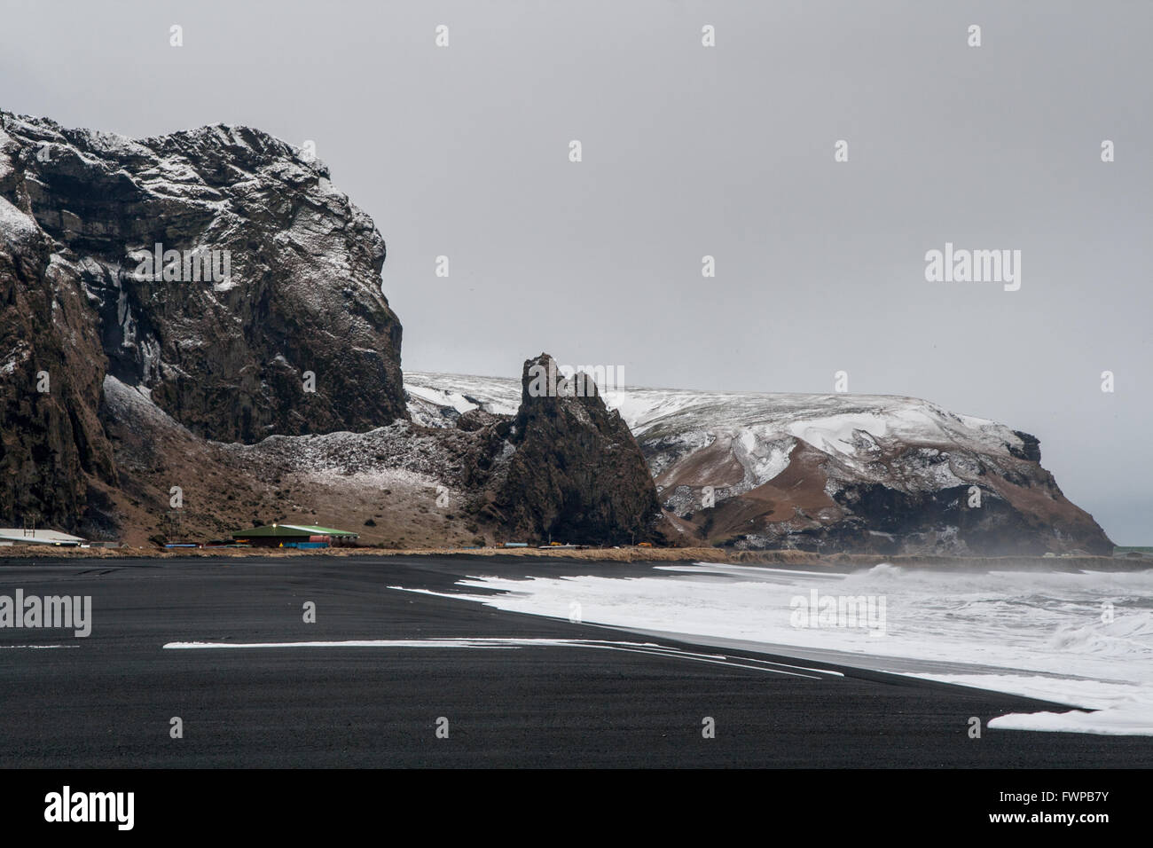 Eastwards along the beach at Vik in winter Stock Photo