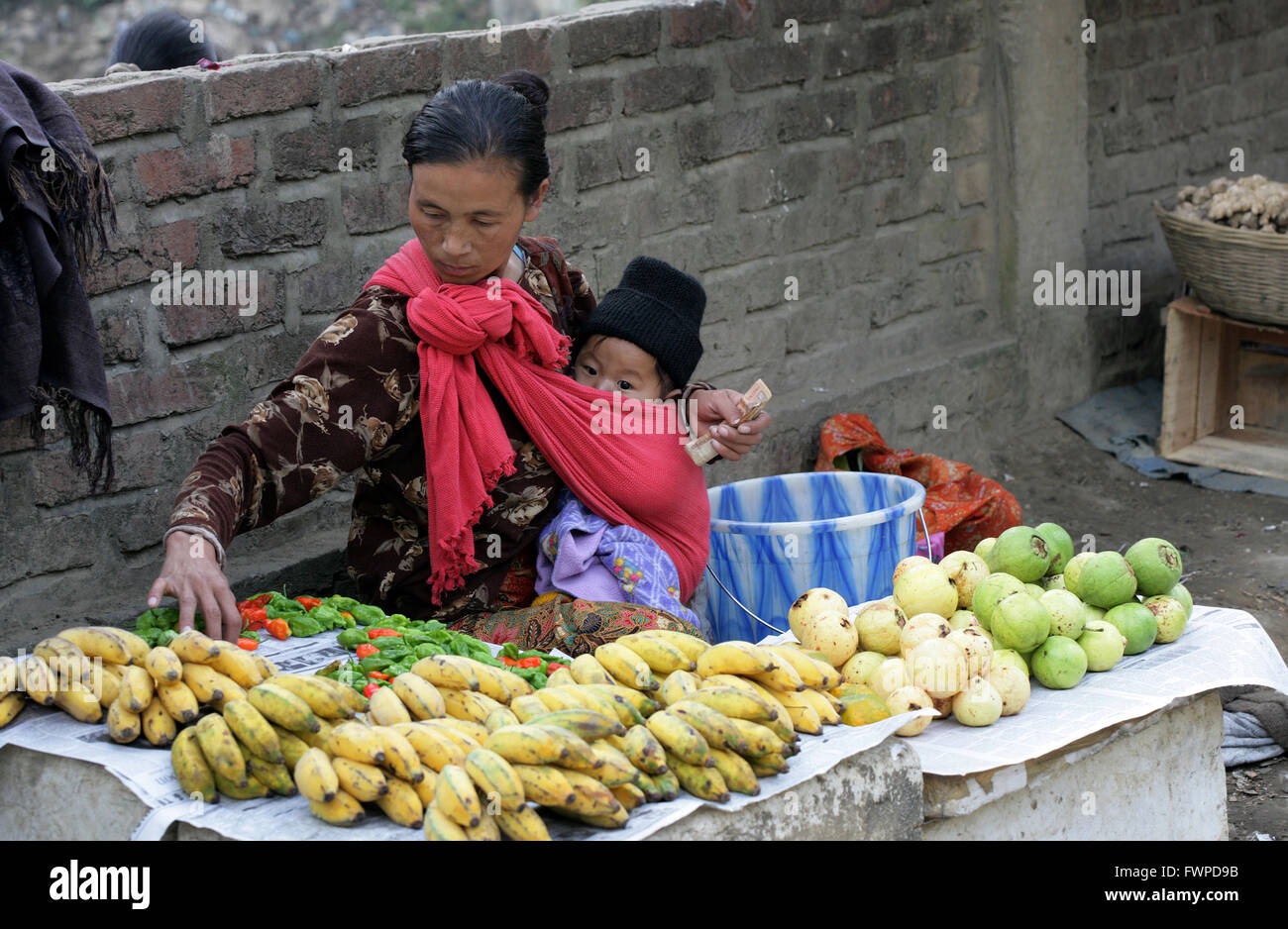 Naga tribal woman sells vegetables at Kohima market, Kohima, Nagaland, India Stock Photo