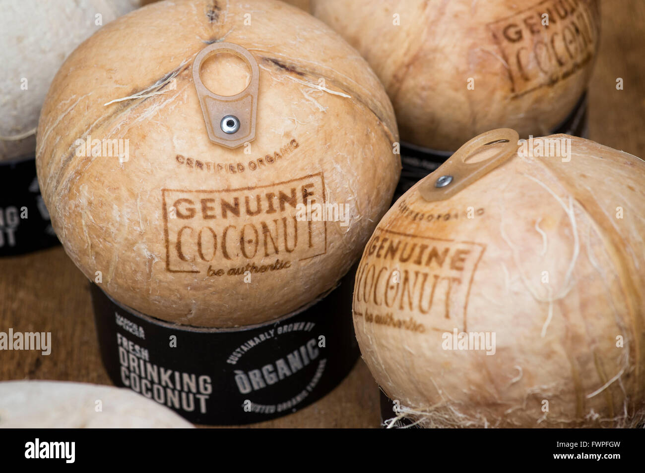 Marks and Spencers organic drinking coconuts with ring pulls Stock