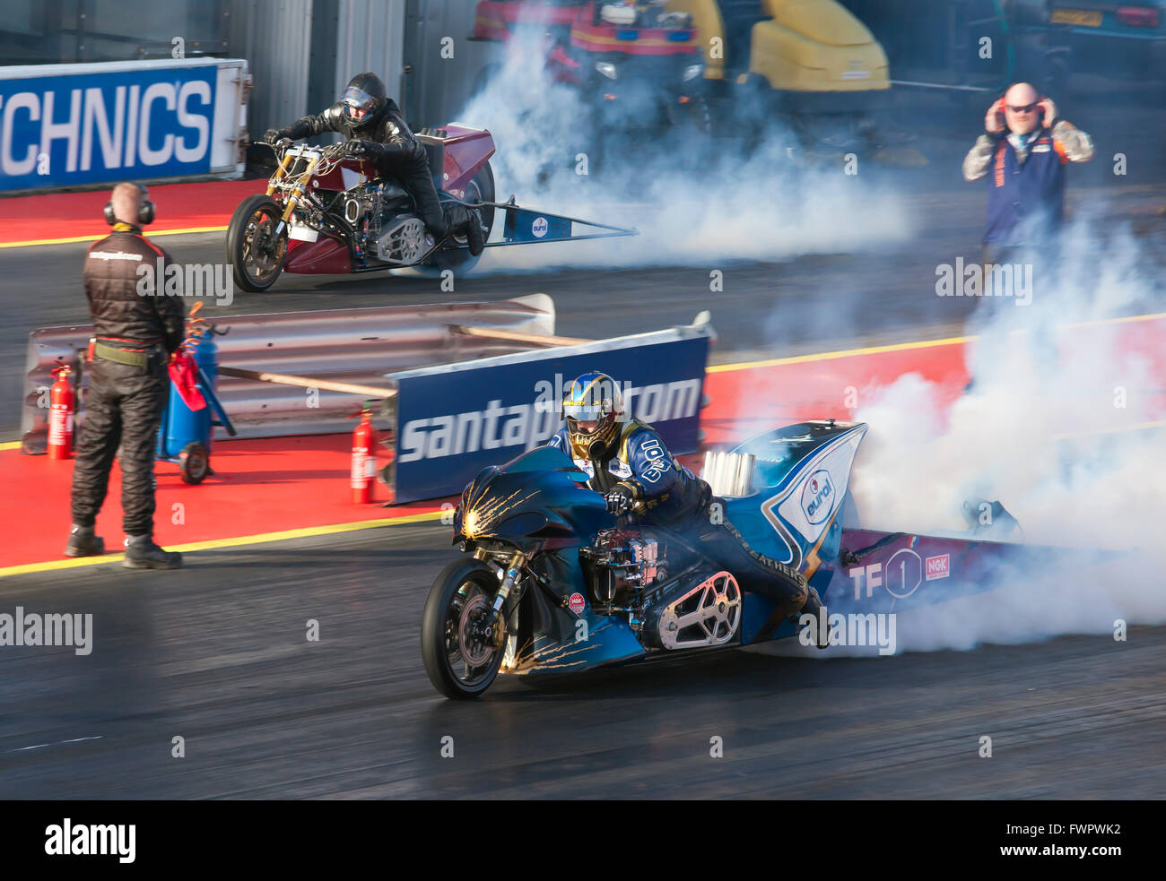 Top Fuel Motorcycle drag racing at Santa Pod Raceway, Rene van den Berg nearside, Nick Milburn far side. Stock Photo