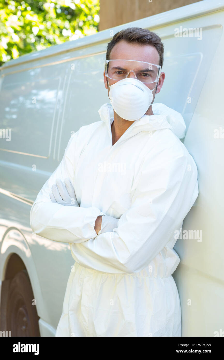 Portrait of pest control man standing next to a van Stock Photo - Alamy