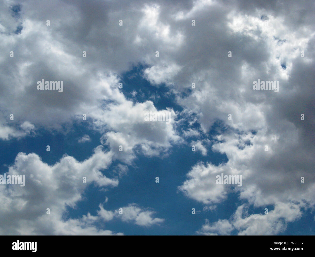 White clouds against blue sky Stock Photo - Alamy