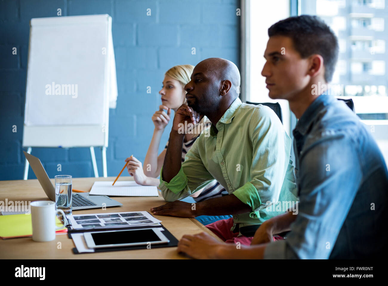 Colleagues attending a meeting Stock Photo