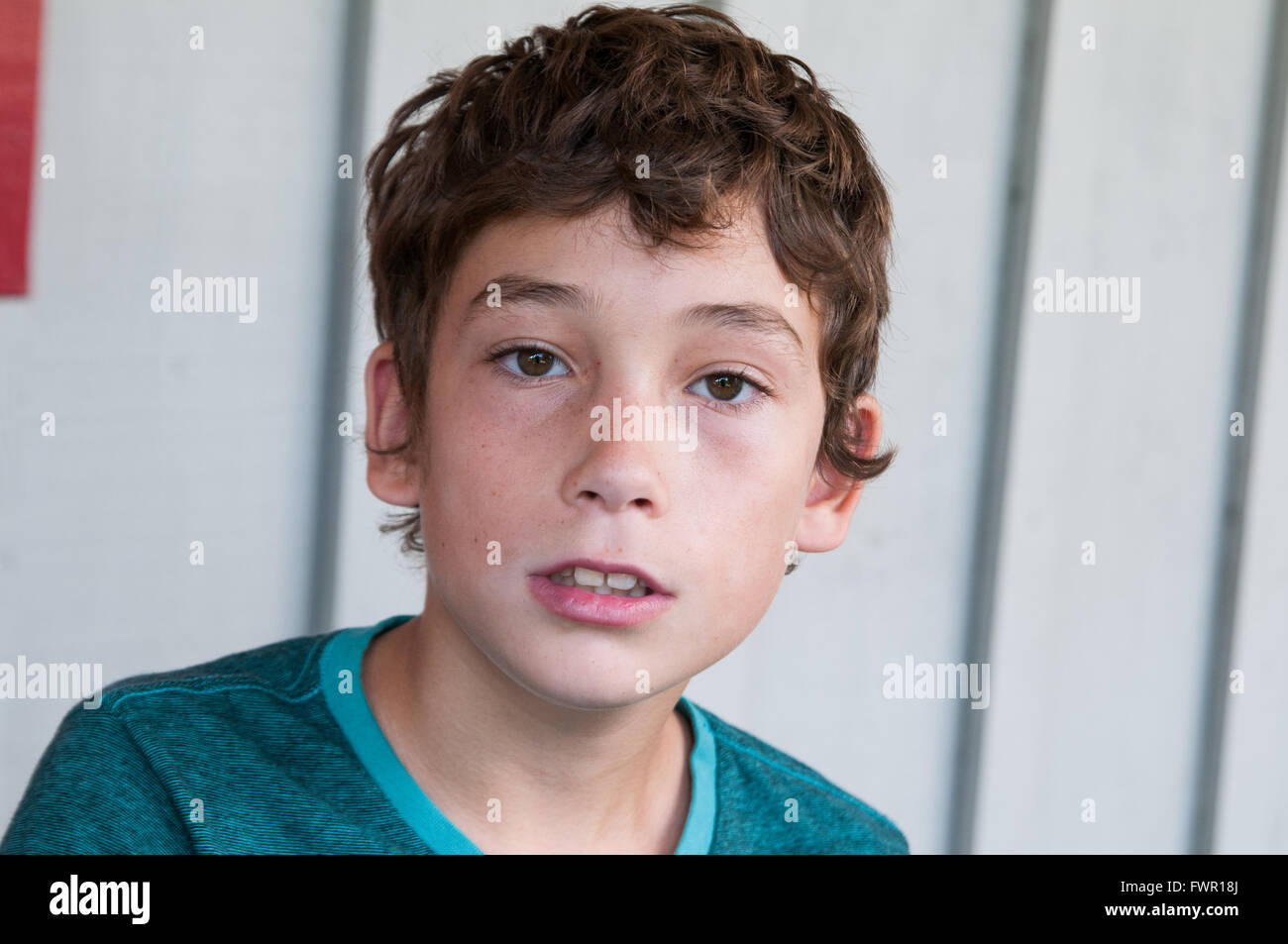 teenage boy with dark brown hair