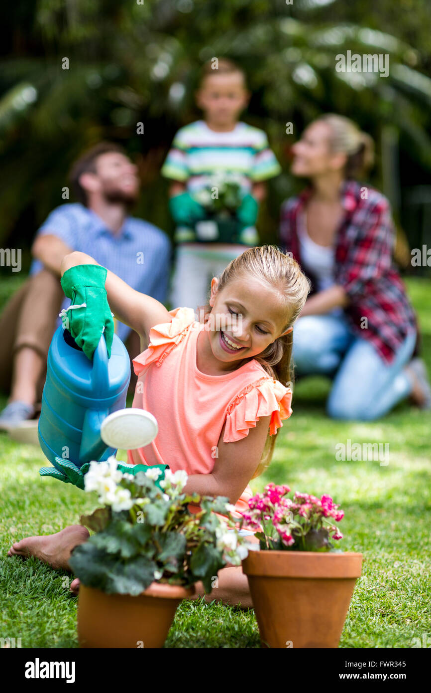 Girl and boy watering plants hi-res stock photography and images - Alamy