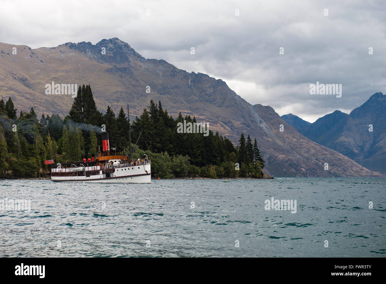QUEENSTOWN, NZ - JAN 7 2016: TSS Earnslaw is the last commercial passenger coal-fired steamship in the southern hemisphere. Stock Photo