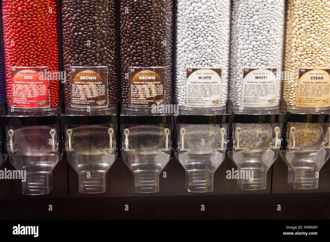 Chocolate dispenser's at the M&M store,Times Square, Manhattan, New York City, United States of America. Stock Photo