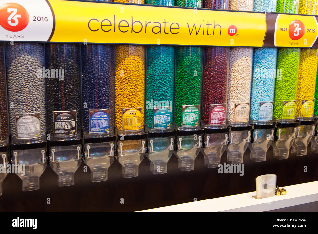 Chocolate dispenser's at the M&M store,Times Square, Manhattan, New York City, United States of America. Stock Photo