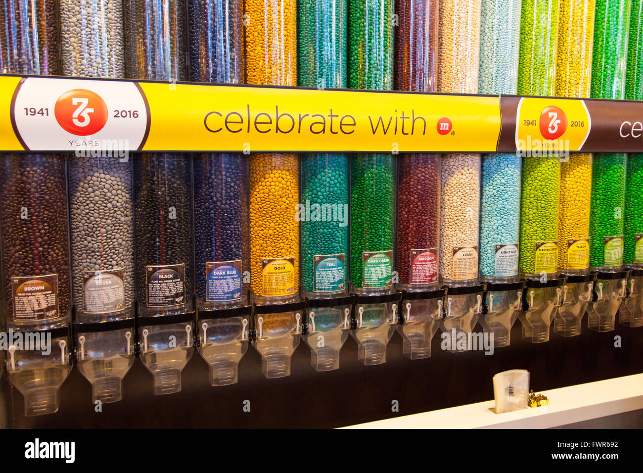 Chocolate dispenser's at the M&M store,Times Square, Manhattan, New York City, United States of America. Stock Photo