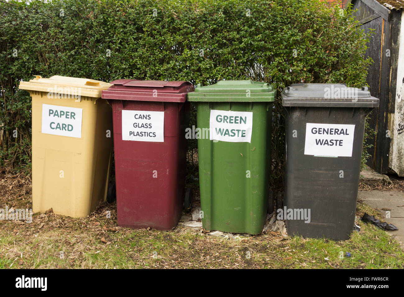 Domestic waste and recycling bins  for paper and card,  cans,  plastic and bottles, food and garden waste, and  general waste. Stock Photo