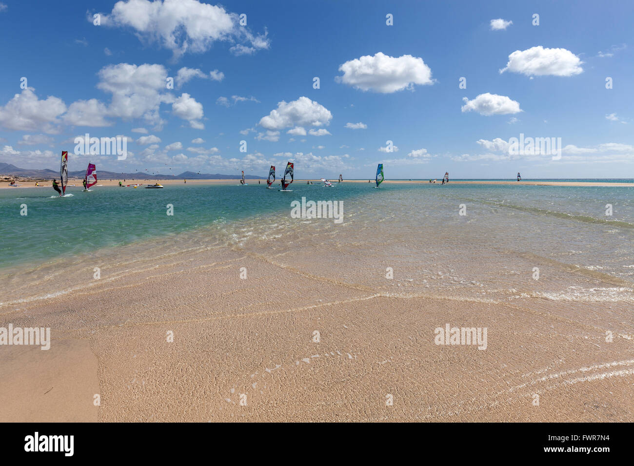 Windsurfer on the beach Playa Risco del Paso, Playa de Sotavento, Jandia, Fuerteventura, Canary Islands, Spain Stock Photo