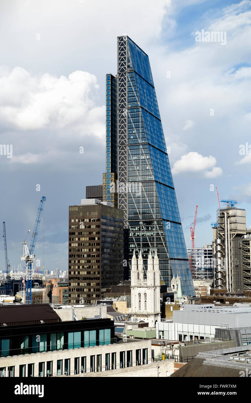 View of the Leadenhall Building (or Cheesegrater) 122 Leadenhall Street in the City of London EC3 on a sunny day with blue sky Stock Photo