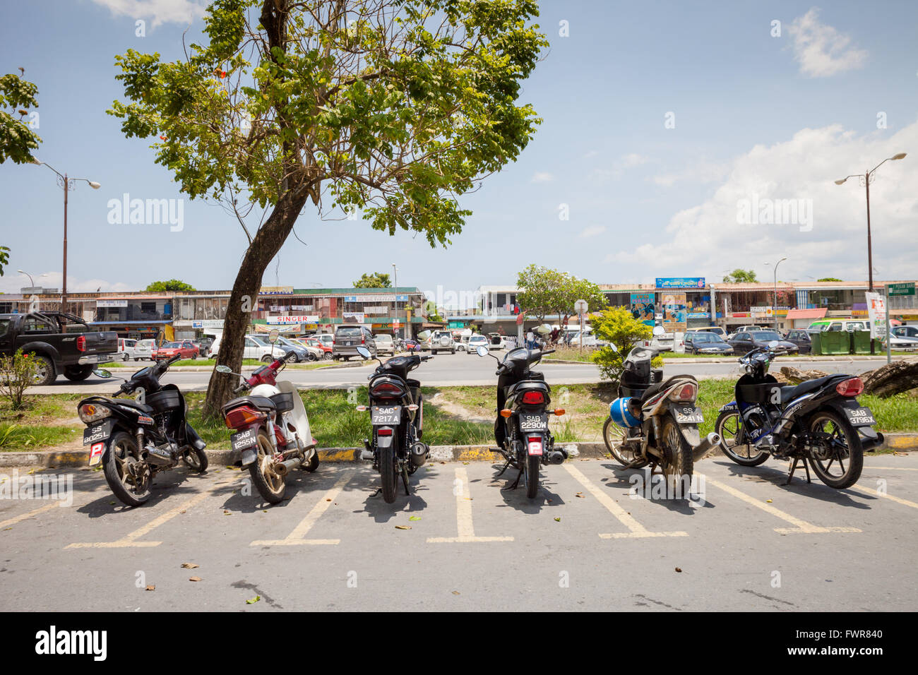 Six Motorbikes Parked By The Shops In The Centre Of Kota Marudu Sabah Borneo Malaysia Stock Photo Alamy