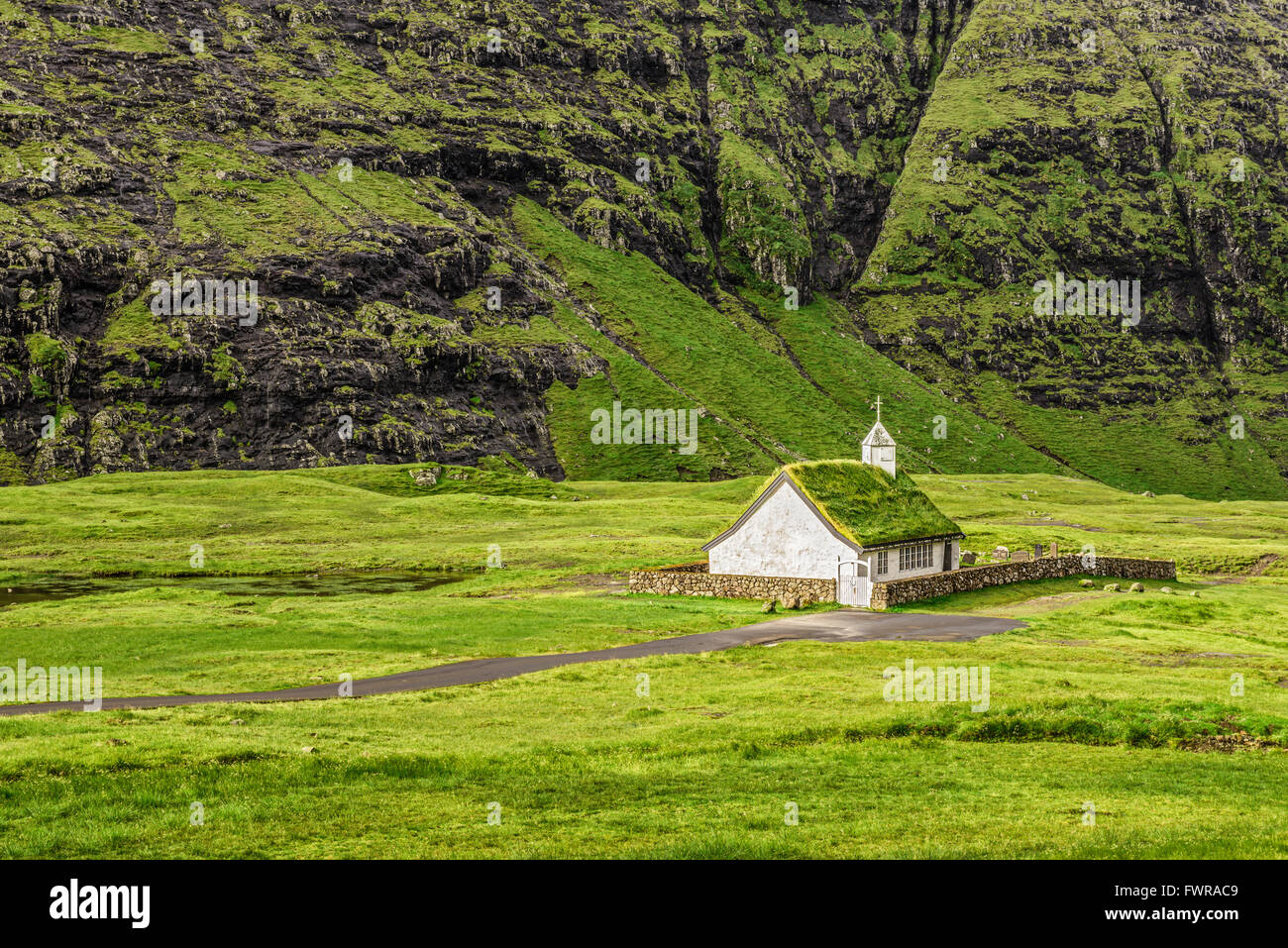 Small village church in Saksun on the island of Streymoy, Faroe Islands, Denmark Stock Photo