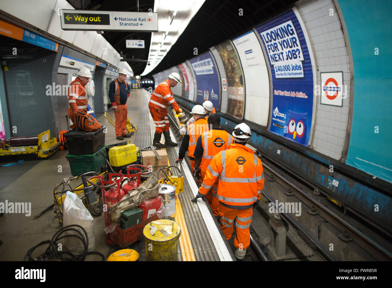 Overnight maintenance workers on the London Underground, central London, England, UK Stock Photo