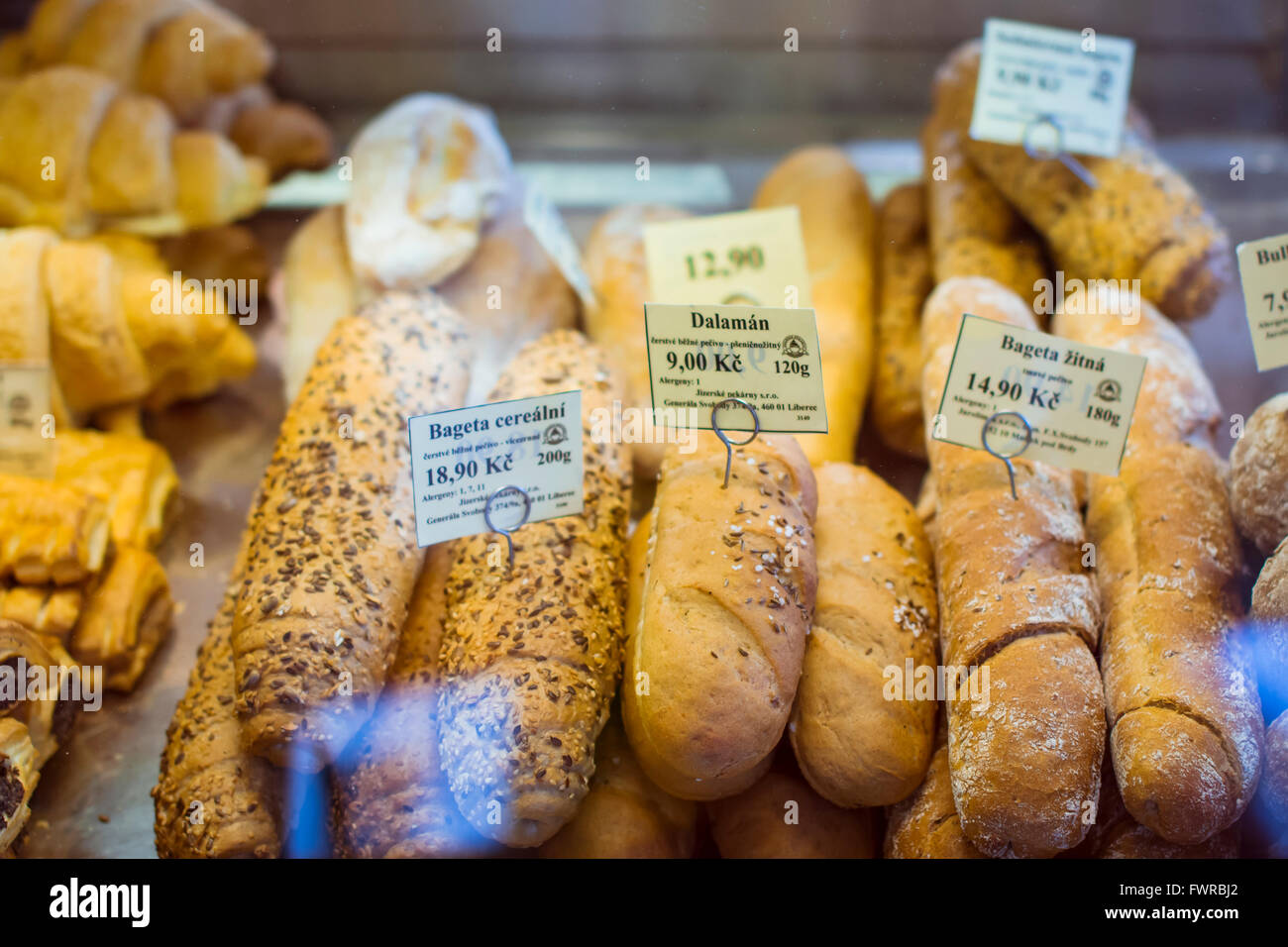 Bakery products, bread and baguette on display in a pastry cafe near