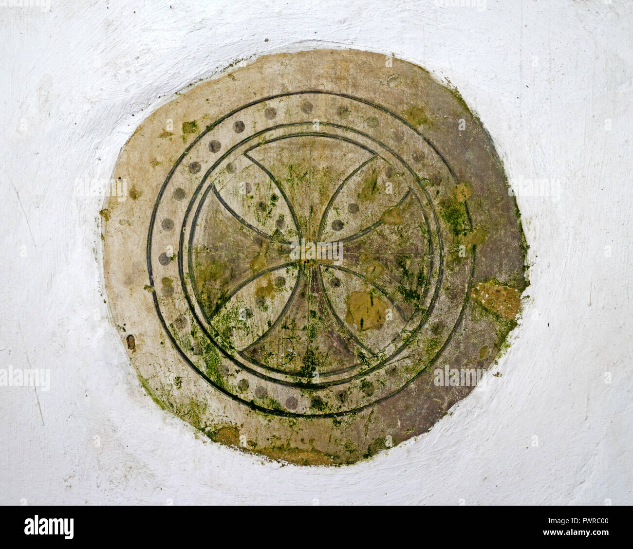 A Consecration Cross in the church of St Margaret at Hardley, Norfolk, England, United Kingdom. Stock Photo