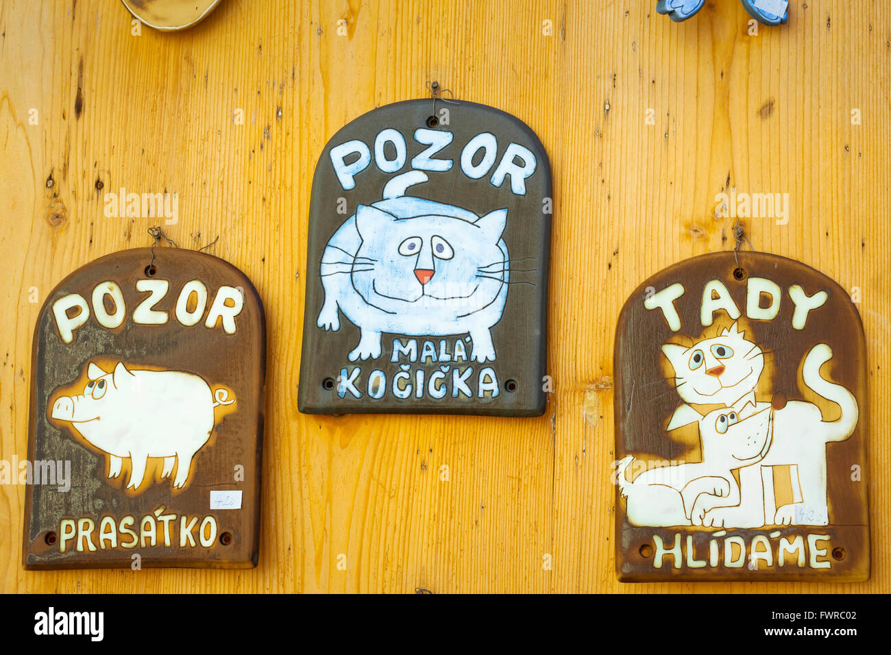 KUTNA HORA, CZECH REPUBLIC - AUGUST 26, 2015: Souvenir pendants with funny  cats and animals in the tourist shop, Kutna Hora Stock Photo - Alamy