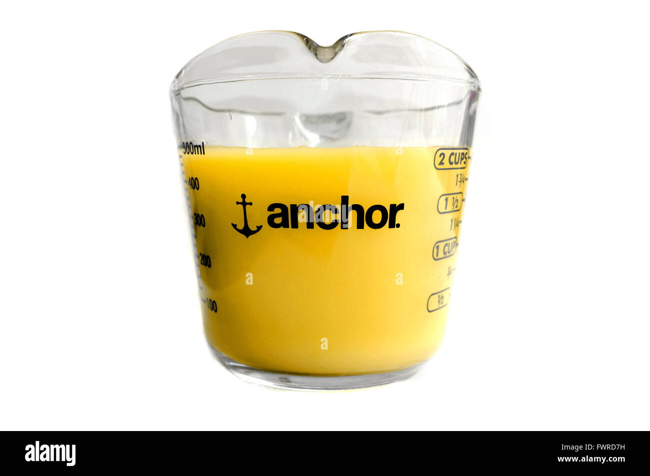 https://c8.alamy.com/comp/FWRD7H/yellow-coloured-liquid-in-an-anchor-measuring-jug-photographed-against-FWRD7H.jpg