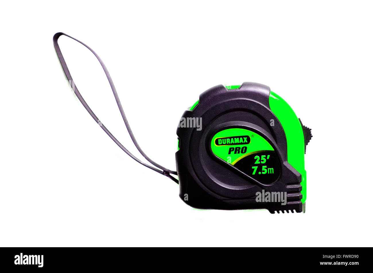 A green measuring tape photographed against a white background Stock