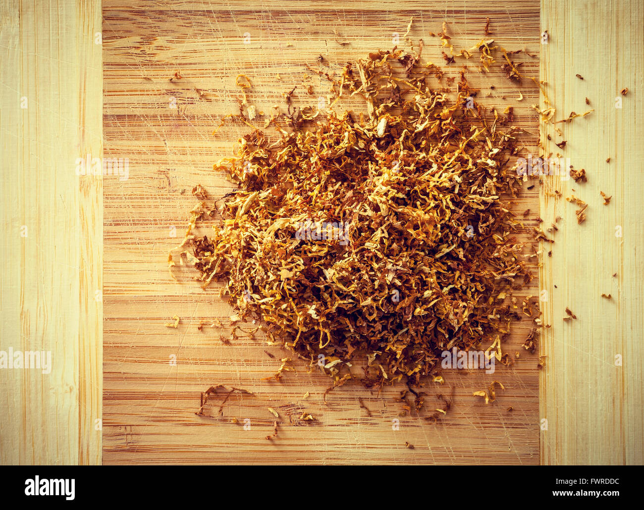 tubing tabacco on wood Stock Photo