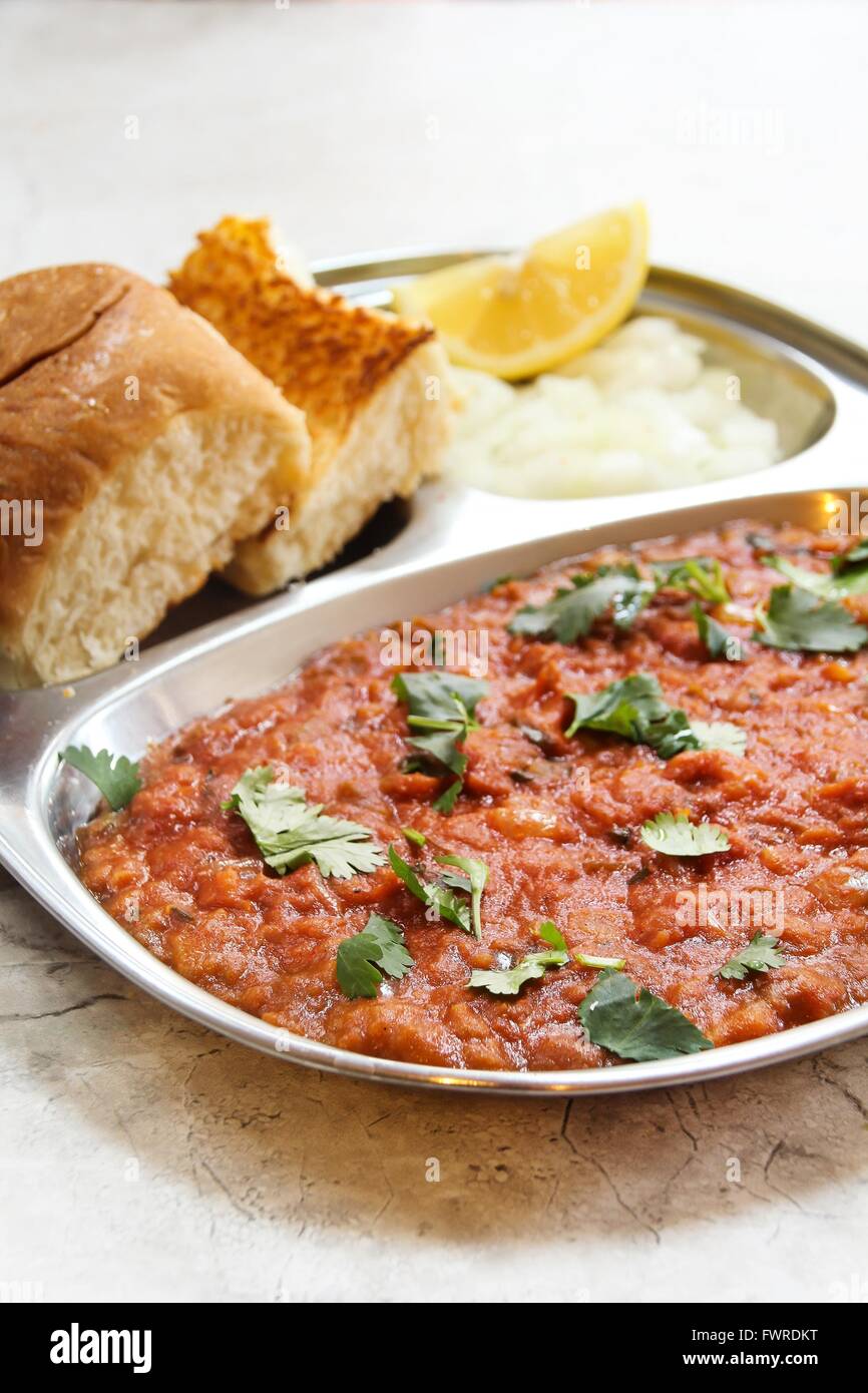 Pav bhaji Masala Indian street food on steel plate Stock Photo